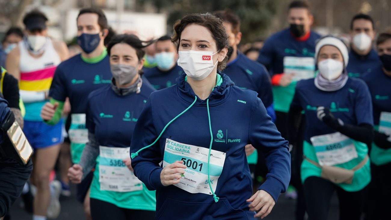 Isabel Díaz Ayuso durante la carrera popular Solidaria Real Madrid