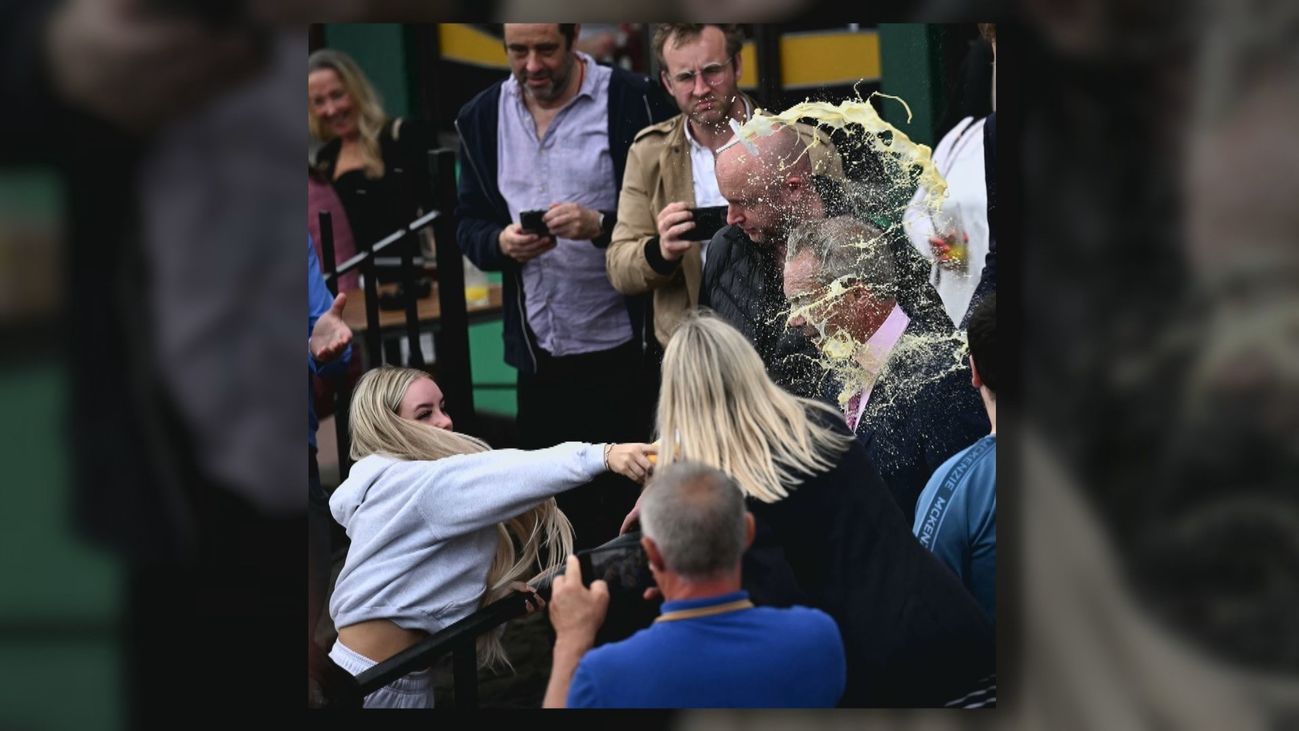 A milkshake is thrown at Nigel Farage after a marketing campaign occasion