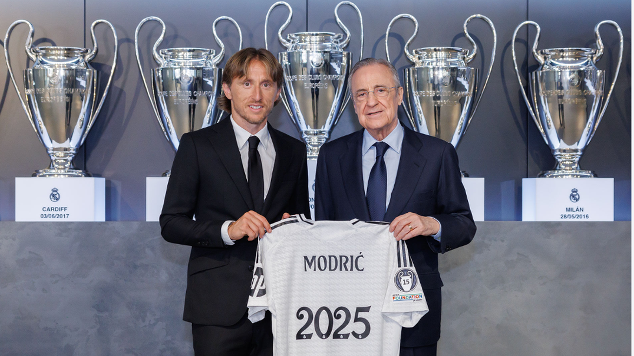 Luka Modric y Florentino Pérez