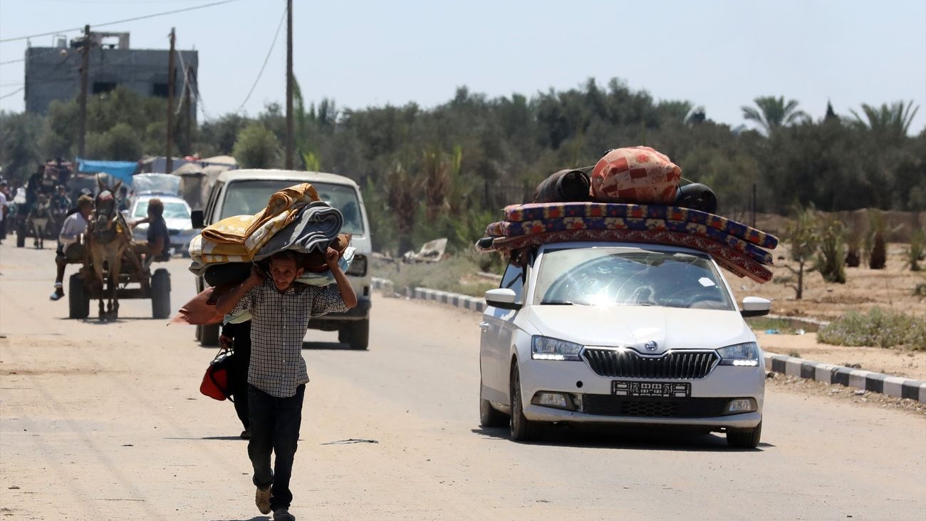 Palestinos intentando huir de Gaza