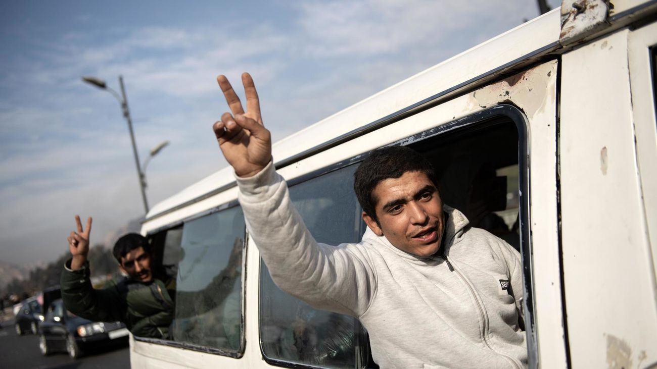 Celebraciones en Damasco tras la toma de la ciudad por los rebeldes.